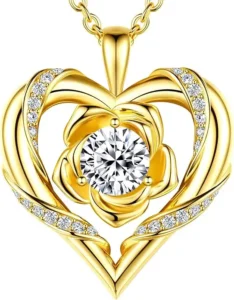 Beam and Bask 18K gold plated S925 silver necklace featuring a brilliant heart-shaped moissanite stone and rose motif, displayed in luxury gift packaging for milestone birthdays and anniversaries.