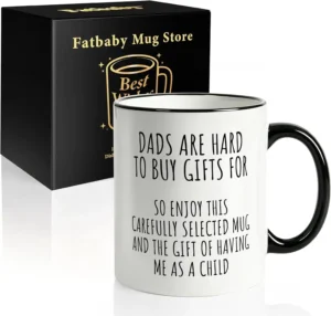 White 11-ounce ceramic coffee mug featuring humorous dad-joke typography, displayed next to a gift box as a funny milestone birthday gift for fathers.