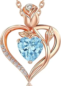 JACUPO jewelry pendant necklace featuring a 1.2 carat heart shaped birthstone embraced by a rose design, crafted in 18K rose gold over 925 sterling silver